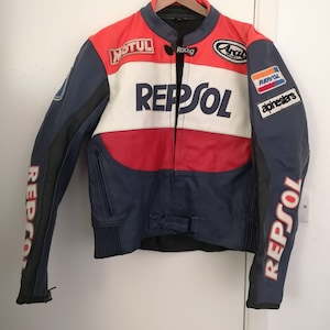 Vintage unisex Repsol moto-cycle racing leather jacket in size XLarge.