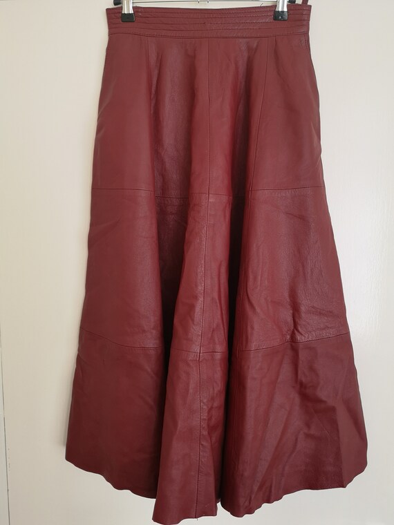 Vintage womens A-line red leather skirt size 38