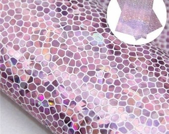May include: Purple iridescent faux leather with a honeycomb pattern. The material is shiny and has a subtle shimmer.