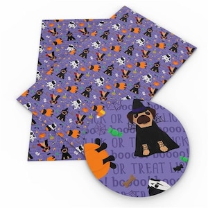 May include: Purple fabric with a repeating pattern of black and white pugs dressed in Halloween costumes. The fabric has a variety of Halloween-themed elements, including pumpkins, candy corn, bats, and spiderwebs. The text "Trick or Treat" is written in a playful font.