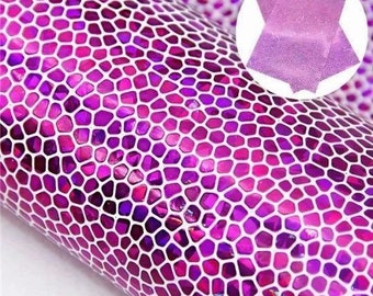 May include: Purple iridescent vinyl with a honeycomb pattern. The vinyl is shiny and has a holographic effect.
