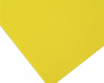 May include: A sheet of bright yellow felt with a textured surface.
