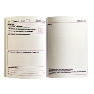 May include: A two-page spread from a journal with a purple and black design. The left page has a section for recording the day, month, and year. The right page has a section for notes and a quote by Albert Schweitzer: "Success is not the key to happiness. Happiness is the key to success. If you love what you are doing, you will be successful."