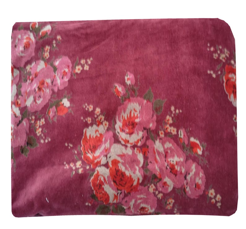 May include: A close-up of a burgundy fabric with a floral pattern. The fabric features pink and red roses with white accents.