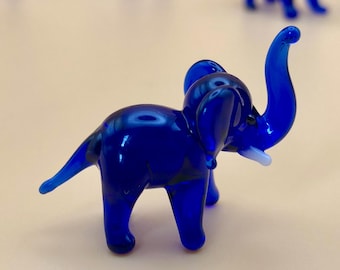Small blue elephant made of glass, handmade glass figurine, lucky charm