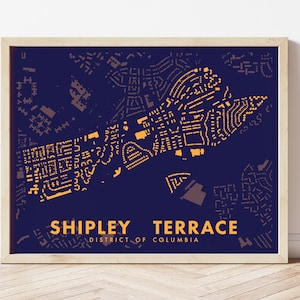 May include: A navy blue print of the Shipley Terrace neighborhood in Washington, D.C. The print shows the street layout of the neighborhood in a stylized, geometric pattern. The text "Shipley Terrace" and "District of Columbia" is printed in yellow at the bottom of the print.