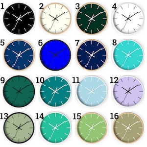 May include: A set of 16 round wall clocks with different colored faces and white hands. The clocks are numbered 1 through 16.
