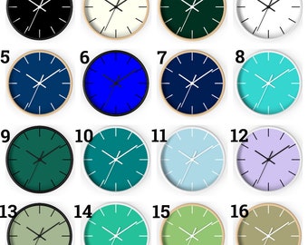May include: A set of 16 round wall clocks with different colored faces and white hands. The clocks are numbered 1 through 16.