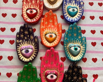 Porta incienso de yeso pintado a mano con forma de estrella en forma de ojo