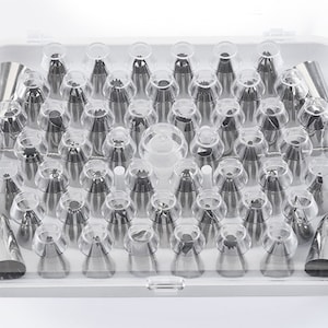 57 Piece Baking Piping Set Includes 52 Stainless Steel Tips, 2x couplers (S,L), 2x Flower Nails in Hinged Storage Box, 1x Silicone Bag