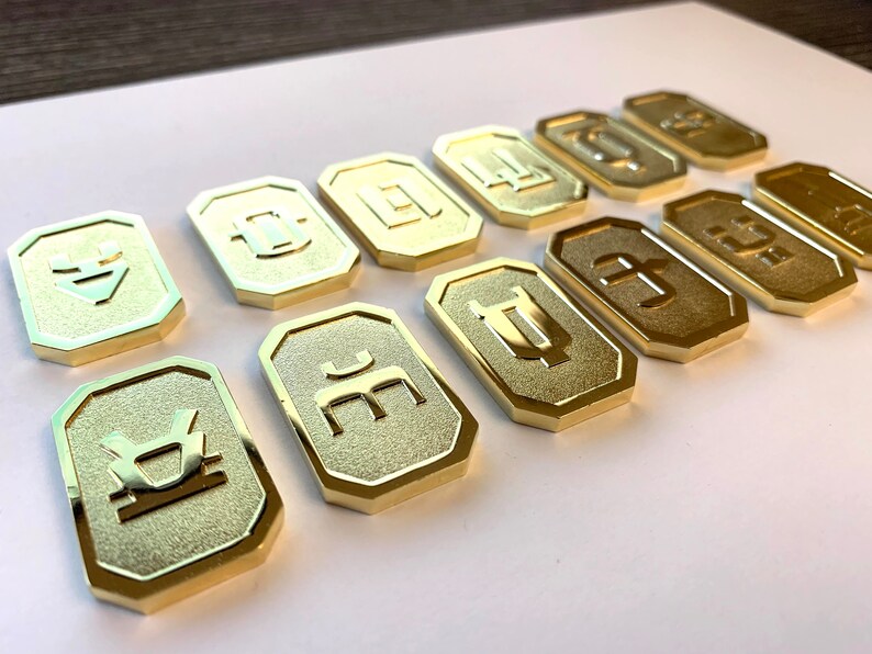 Set of 12 Gold-Tone Battlestar Galactica Cubit Currency