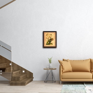 Peut inclure: Une illustration botanique encadr&eacute;e d'un tournesol avec une tige et des feuilles vertes. L'arri&egrave;re-plan est un papier parchemin de style vintage avec une bordure rouge.