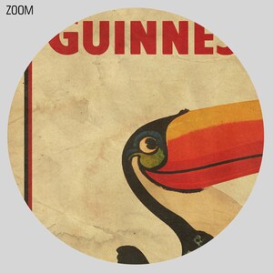 May include: A vintage-style poster with the word "GUINNESS" in red letters. A toucan with a black body, red beak, and yellow and orange markings is peeking out from the right side of the poster.