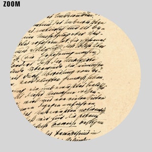 May include: A close-up of a handwritten note on a piece of aged paper. The note is written in black ink and contains a series of sentences in German. The paper is yellowed with age and has a rough texture.