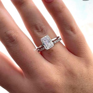 New In! Sterling Silver 925 Bridal Set with 2CT or 3CT CZ Radiant Cut engagement ring with hidden halo and half eternity band.