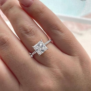 Hidden Halo. Sterling Silver 925, yellow gold vermeil  engagement ring with 3CT princess cut simulated diamond and hidden halo.