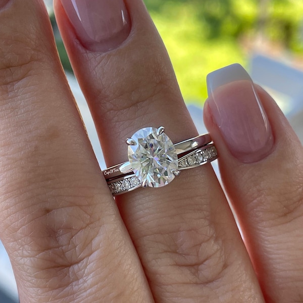Moissanite engagement ring set. Sterling Silver 925 bridal set with 2CT oval cut moissanite or CZ solitaire and curved wedding band.