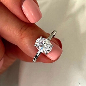 Moissanite. Hidden halo.  Sterling Silver 925 Engagement Ring with 2CT(7mm*9mm)  oval cut moissanite and hidden halo