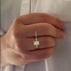 The Alessandra. 18K Yellow Gold Over Sterling Silver 925 Engagement Ring with the finest 2CT Radiant cut simulated diamond.