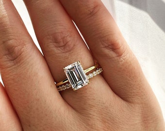 New In! Hidden halo. Yellow gold, white gold over sterling silver 925 bridal set with 3CT emerald cut Solitare and half eternity band