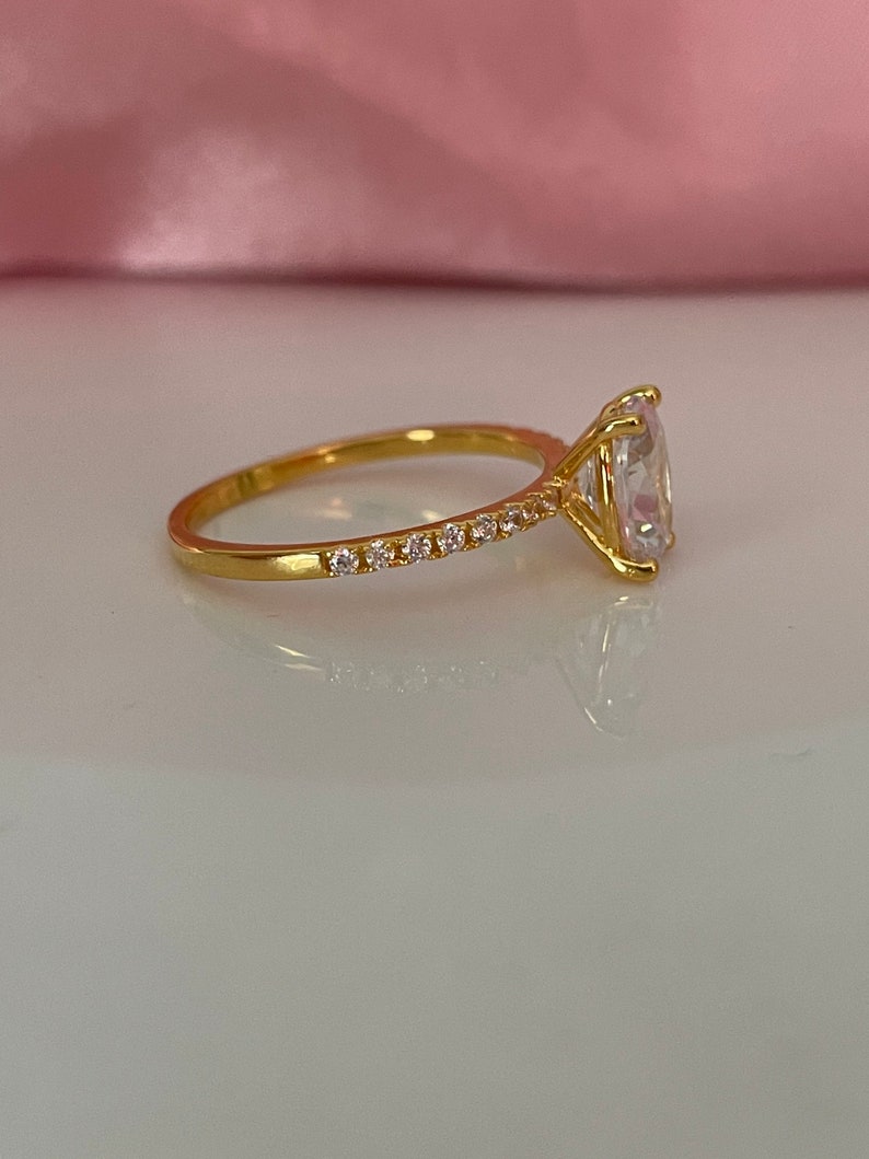 The Olivia. Yellow Gold Vermeil Engagement Ring with the finest 2CT oval cut simulated diamond image 5