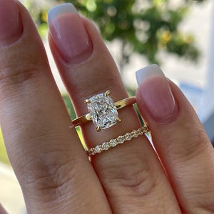 Yellow Gold, White gold over Sterling Silver 925 Bridal Set with 2.5 Elongated CZ Cushion Cut engagement ring and half eternity band.