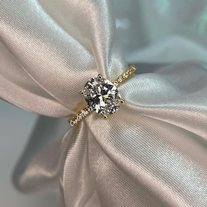 The Olivia. Yellow Gold Vermeil Engagement Ring with the finest 2CT oval cut simulated diamond