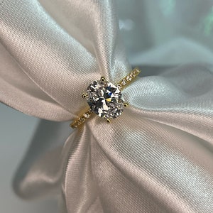 The Olivia. Yellow Gold Vermeil Engagement Ring with the finest 2CT oval cut simulated diamond