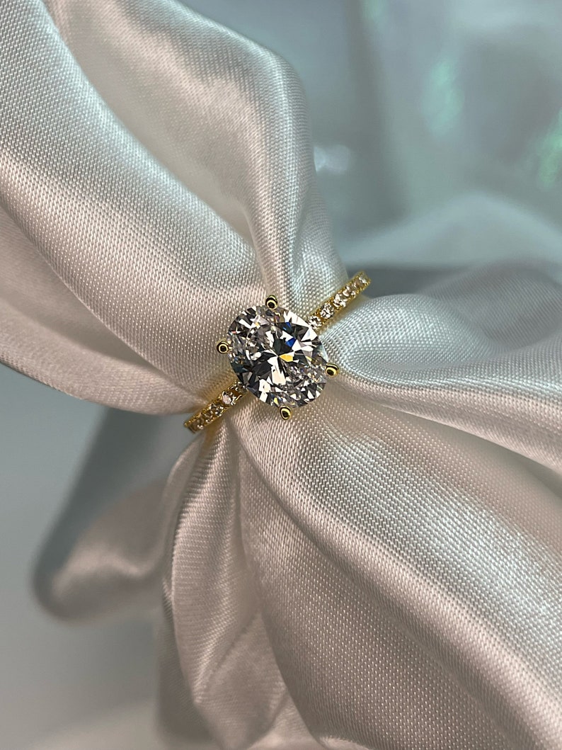 The Olivia. Yellow Gold Vermeil Engagement Ring with the finest 2CT oval cut simulated diamond image 1