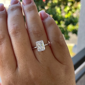 The Grace. Hidden halo. Sterling Silver 925 engagement ring with 2CT,  3CT radiant cut CZ simulated diamond and hidden halo.