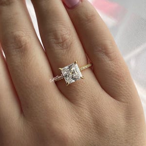 Hidden Halo ring. 18K yellow gold over Sterling Silver 925 engagement ring with 3CT princess cut simulated diamond and hidden halo.