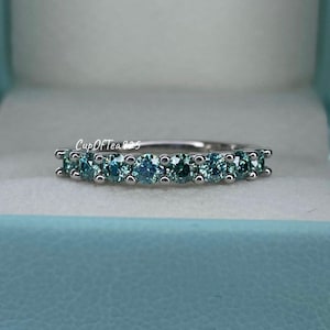 Aqua Blue Moissanite ring. Sterling silver 925 half eternity band with Aqua Blue Moissanite