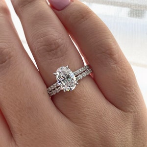 New In! Sterling Silver 925 bridal ring set with 2.2CT CZ oval cut engagement ring with hidden halo and half eternity band