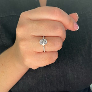 The Olivia. 2CT Oval Cut Engagement Ring in Sterling Silver 925 with moissanite or CZ diamonds
