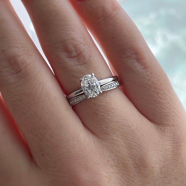 Sterling Silver 925 Bridal set with 1.5CT oval cut CZ simulated diamond solitaire engagement ring and curved moissanite band.