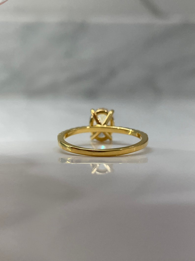 The Olivia. Yellow Gold Vermeil Engagement Ring with the finest 2CT oval cut simulated diamond image 4