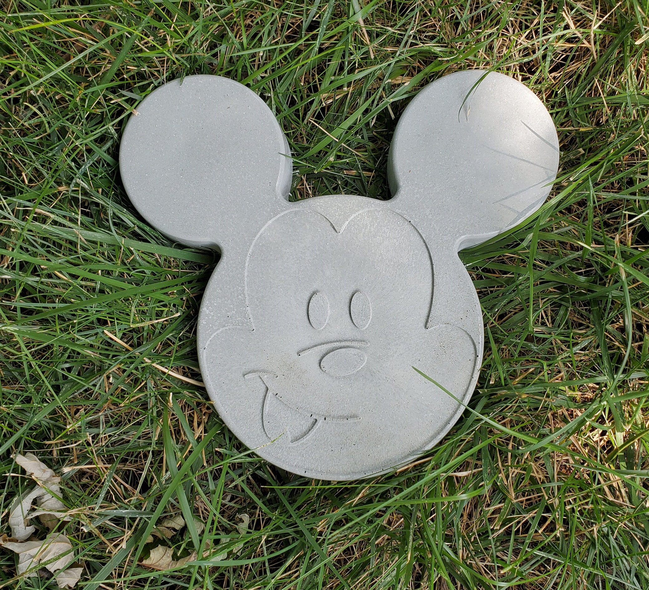 cement mickey mouse statue