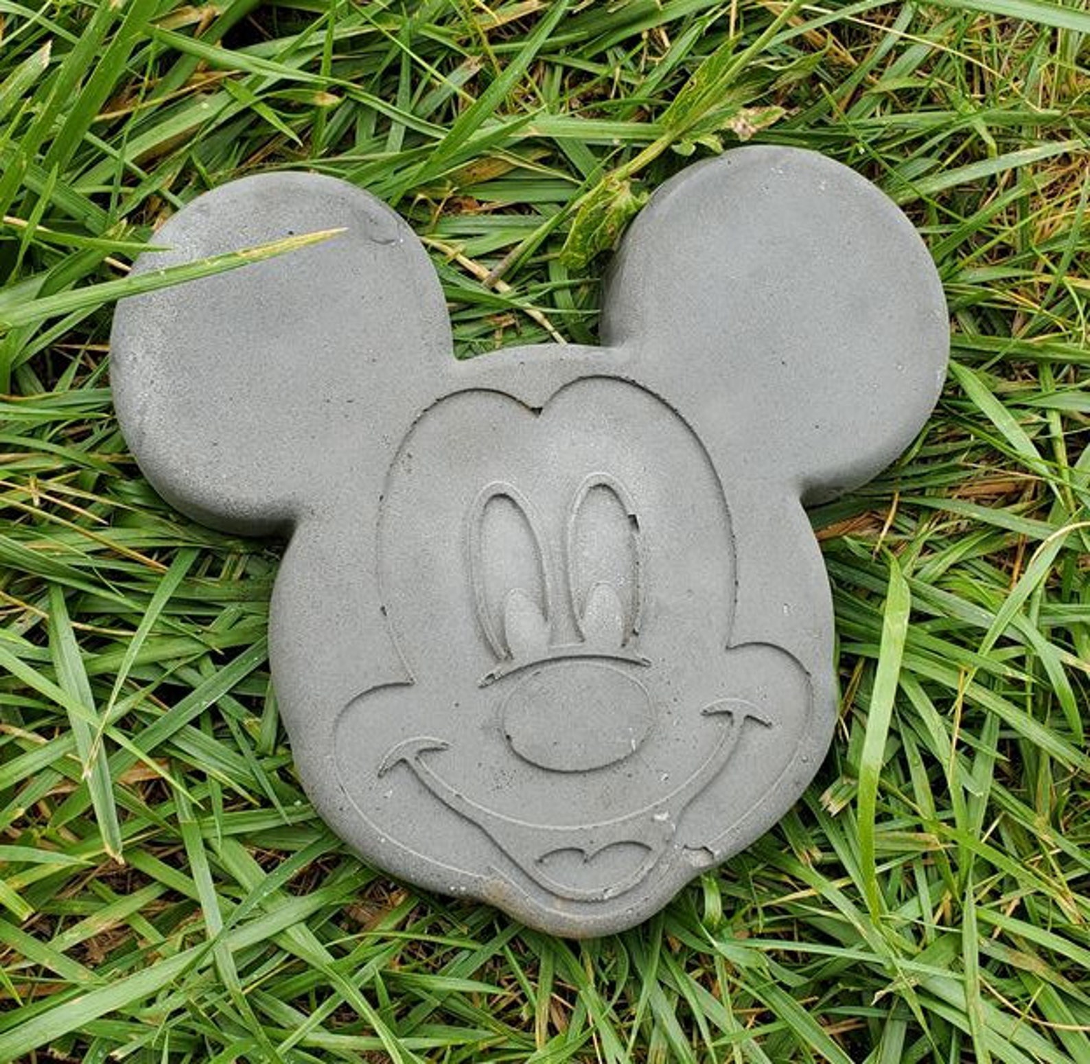 cement mickey mouse statue