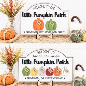 May include: A rectangular wooden sign with an arched top featuring the text "Welcome to our Little Pumpkin Patch" or "Welcome to Nonna and Popo's Little Pumpkin Patch" and "Grown with love. Picked with care." It includes colorful wooden pumpkin cutouts with small name tags.
