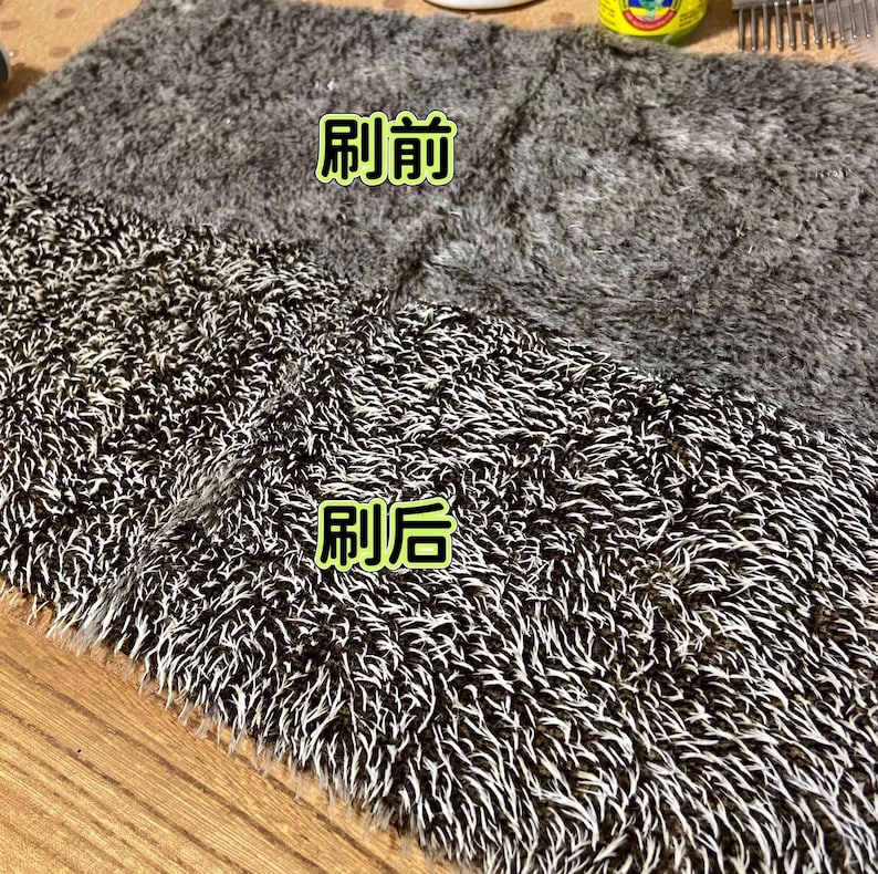 May include: A split image showing a section of a gray rug before and after brushing. The top half is unbrushed, appearing matted and dark gray. The bottom half is brushed, revealing a lighter gray and white pattern. The Chinese characters "Before Brushing" and "After Brushing" are visible.