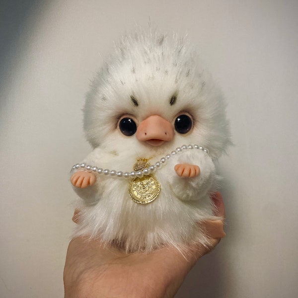 Fantasy animal Baby Niffller art doll Gift for birthday  This is a baby white glass beast, sniff