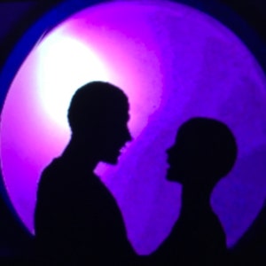 May include: Silhouettes of two people facing each other against a purple and white background. The background resembles a moon.