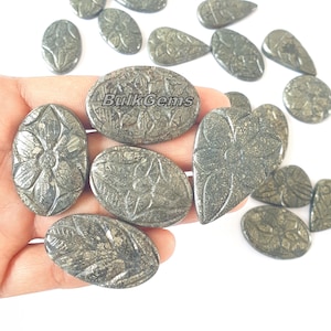 Geschnitztes Markasit-Edelstein-Lot, poliertes Stein-Schmuckzubehör