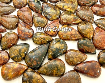 May include: A collection of teardrop-shaped, polished, natural gemstone cabochons. The stones are a mix of brown, green, and gold colors with a swirling, marbled pattern. The stones are approximately 1 inch in length.