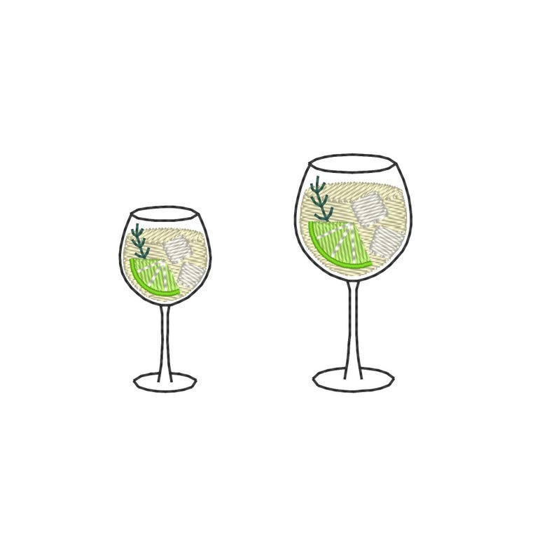 May include: Two embroidered wine glasses, one smaller than the other, each filled with a cocktail. The drinks feature ice cubes, a lime wedge, and sprigs of greenery. The glasses have thin stems and are set against a white background.