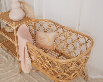 crate and barrel rattan bassinet