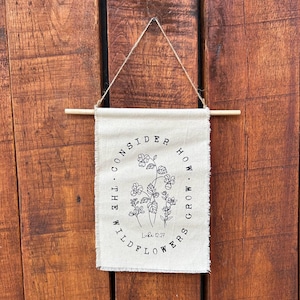 Consider how the wildflowers grow / canvas banner / Luke 12:27