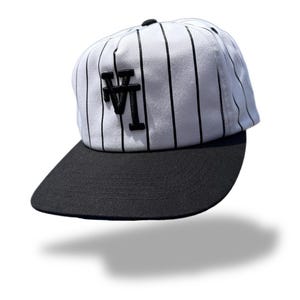 upside down LA logo on unstructured vintage pinstripe SnapBack