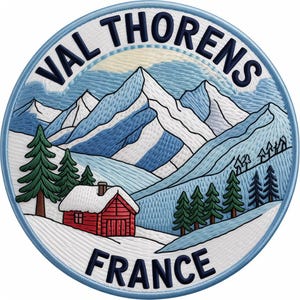 May include: Embroidered patch featuring a winter mountain scene with the text "VAL THORENS FRANCE". The design includes snow-covered mountains, evergreen trees, and a red cabin. The patch has a blue border.