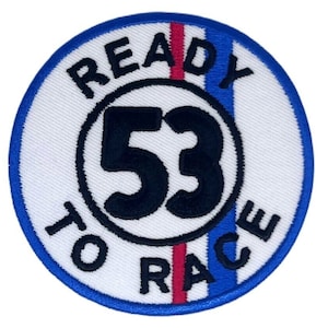 Peut inclure: Patch rond blanc brodé avec des rayures bleues et rouges. Le patch dit "Ready to Race" avec le numéro "53" dans un cercle.